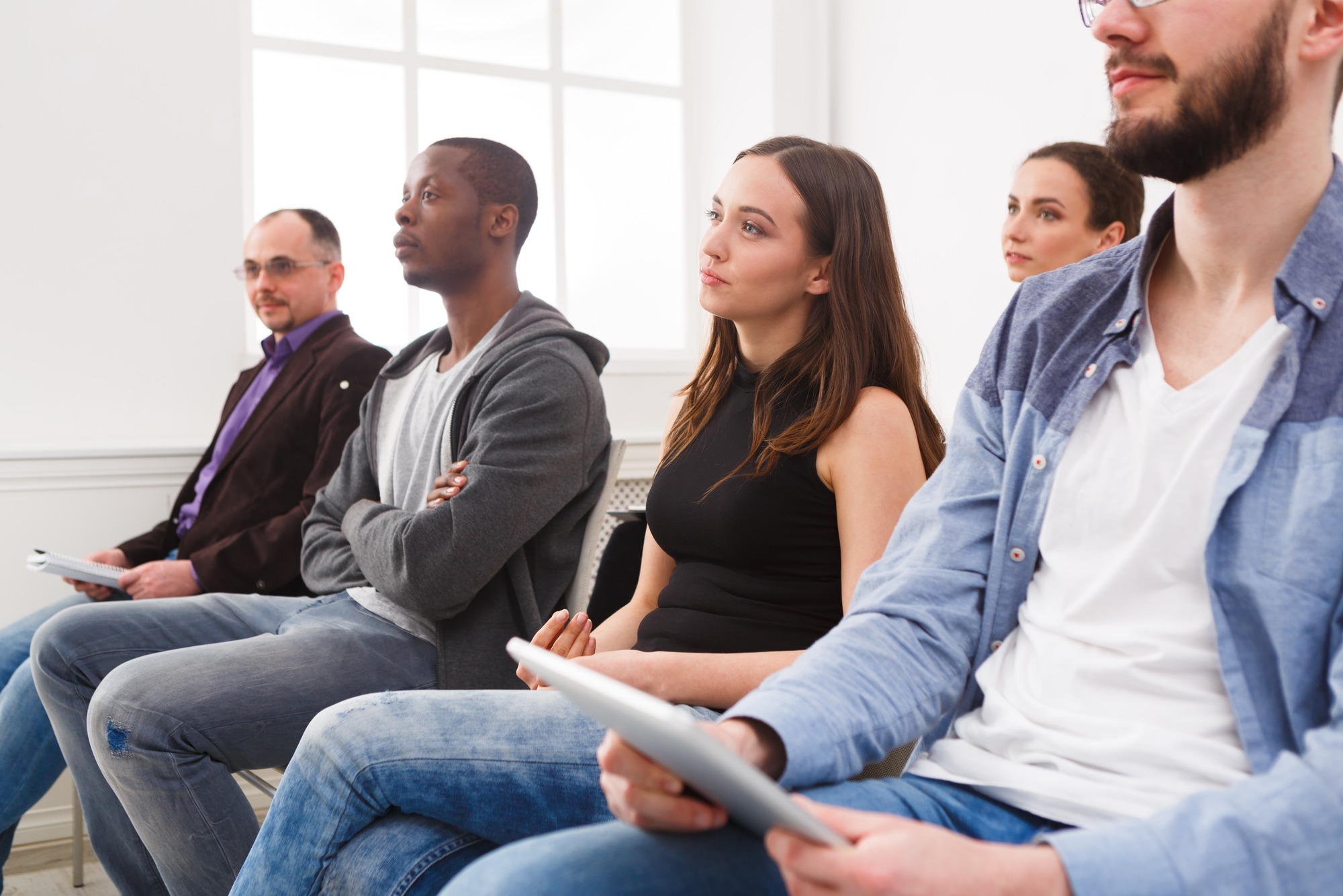 Group of people sitting at seminar